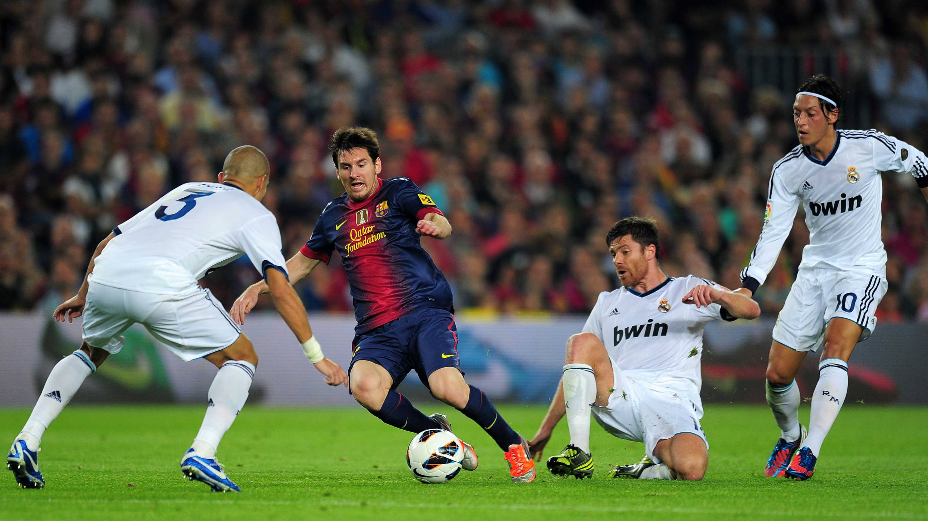 messi with three defenders on him