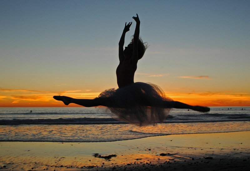 Dancer On The Beach